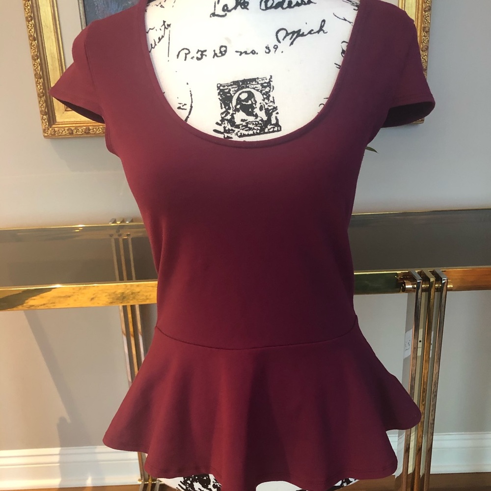 BEBE peplum top